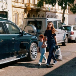 CYBEX Solution G2 Folding Travel High-Back Booster -Tiny Baby Essentials Store CYB 24 US SolutionG2 CampaignImage CarryHandle screen HD