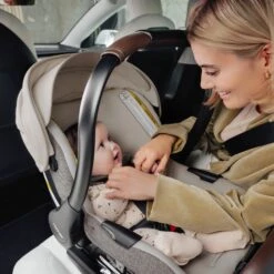 Romer Juni Infant Car Seat With Versa Base -Tiny Baby Essentials Store E1D151T JUNI TRUFFLE ATF 4 MASTER ROMER