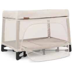 UPPAbaby Remi Bedside Bassinet + Playard + Travel Crib -Tiny Baby Essentials Store REMI22 CHR PanelOpen 5163x3860 9d2a095