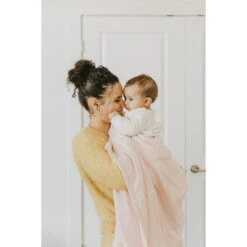 Little Unicorn Deluxe Muslin Quilt -Tiny Baby Essentials Store blush quilt lifestyle little unicorn