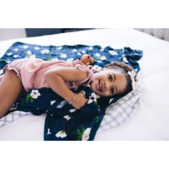 Little Unicorn Deluxe Muslin Quilt -Tiny Baby Essentials Store happy baby snuggling quilt